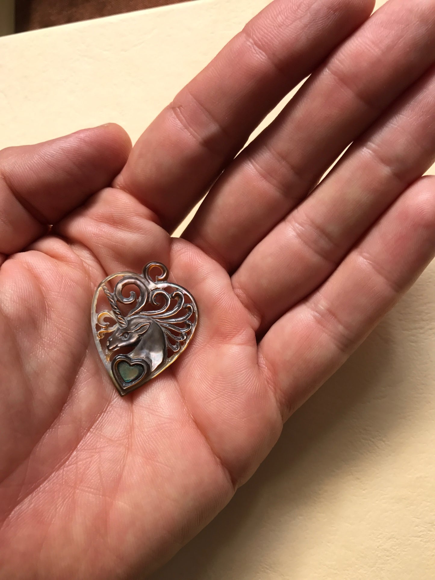 Unicorn Heart pendant guitar pick hand