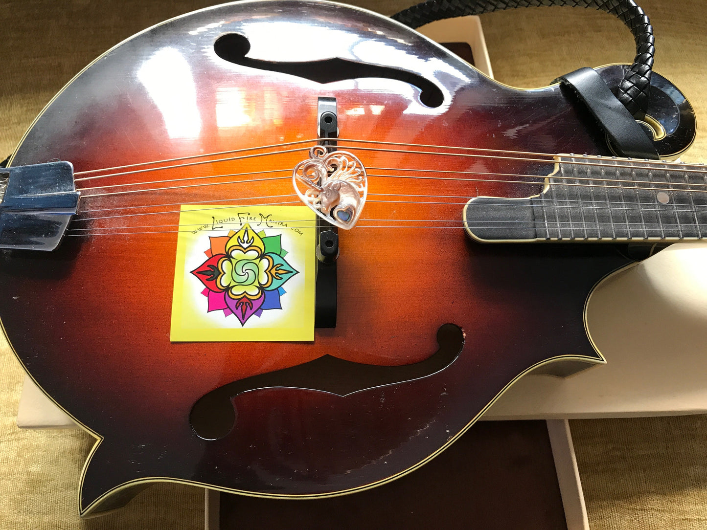 Unicorn Guitar Pick Pendant - Dark Mother of Pearl Liquid Fire Mantra
