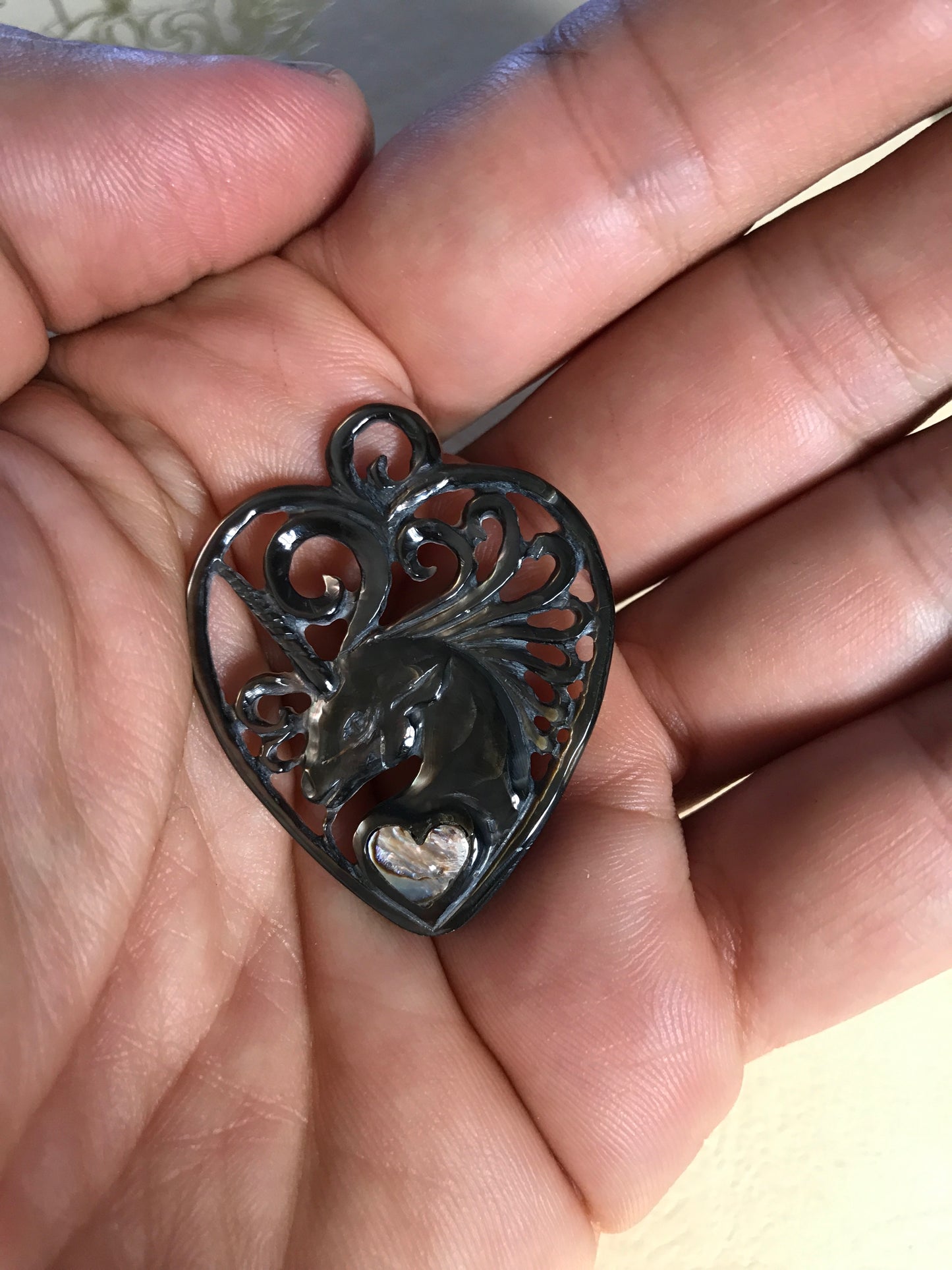 Unicorn Heart pendant guitar pick hand