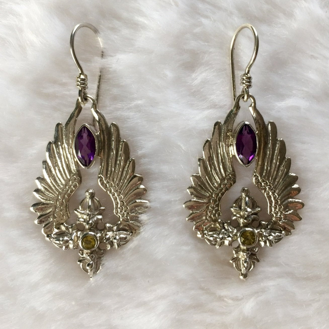 flying vajra earrings