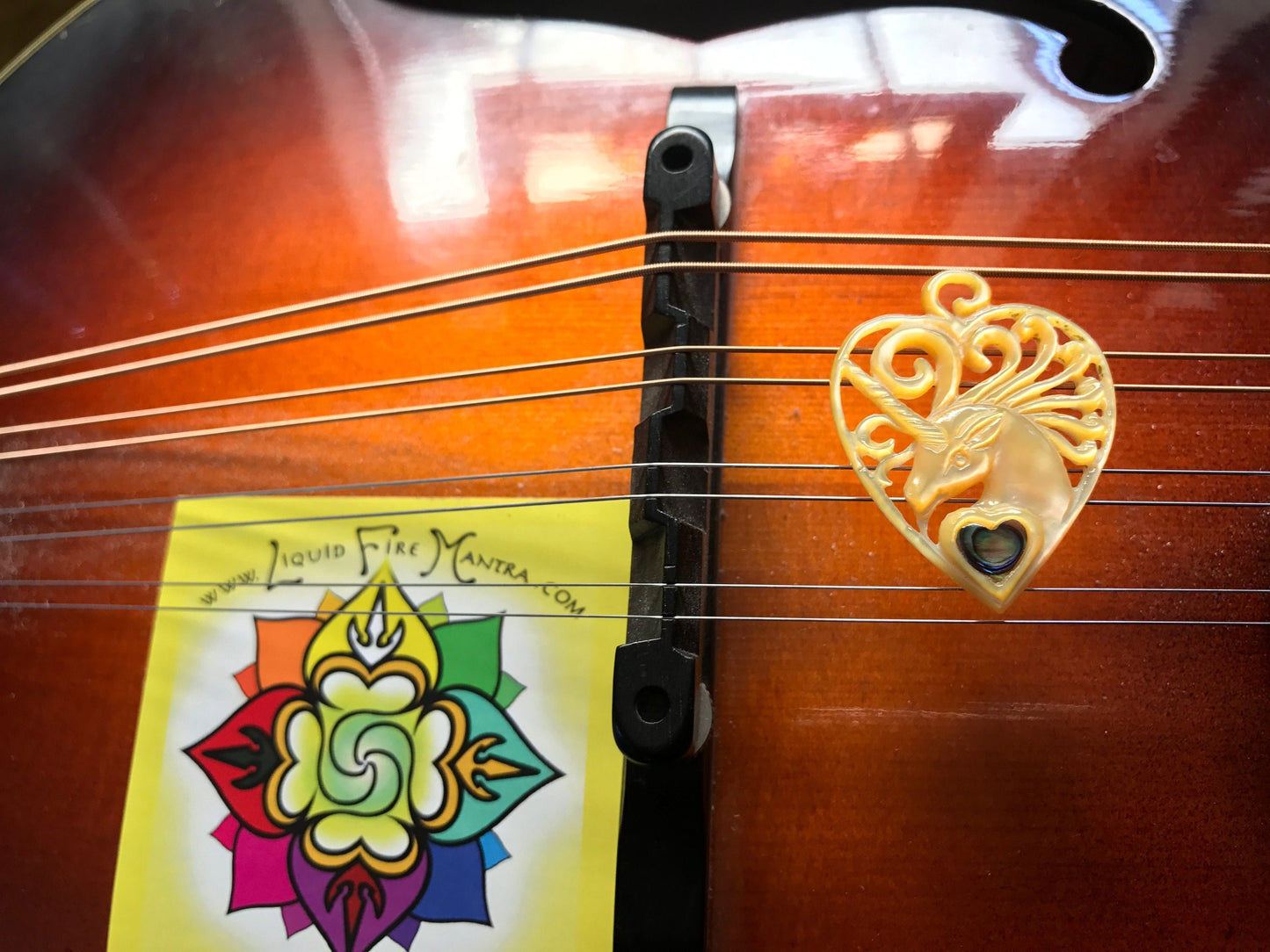 Unicorn Guitar Pick Pendant - Light Mother of Pearl Liquid Fire Mantra