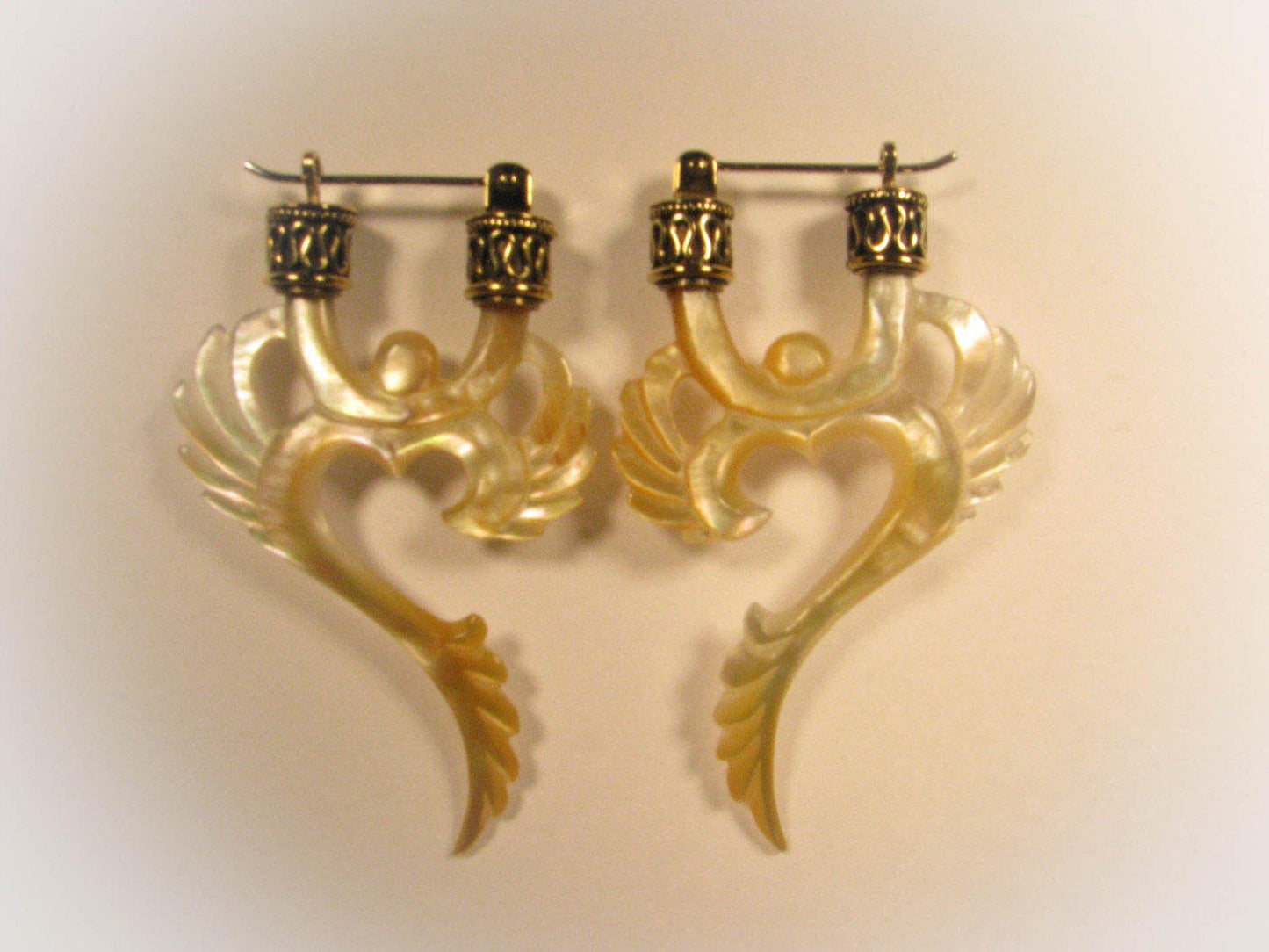 Winged Om Earrings